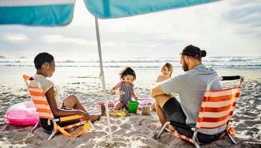 Foto von Familie am Strand